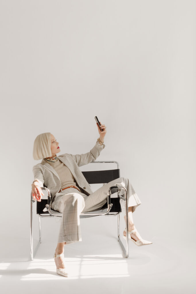 branding photoshoot session showing relaxed seated pose with natural direction in studio