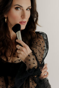 Beauty by Brigid applying makeup for branding photos using professional brush technique