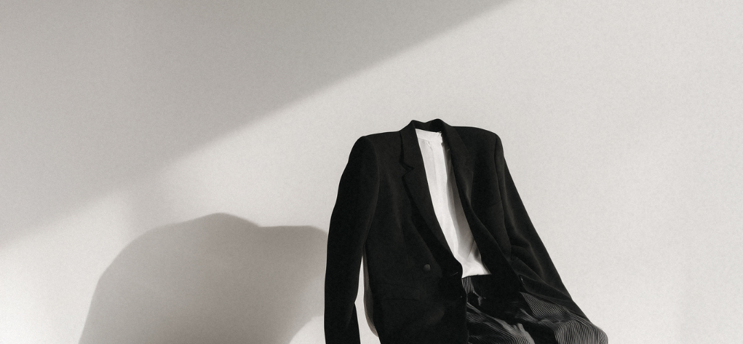 Neutral blazer outfit for branding photos in editorial style studio setting