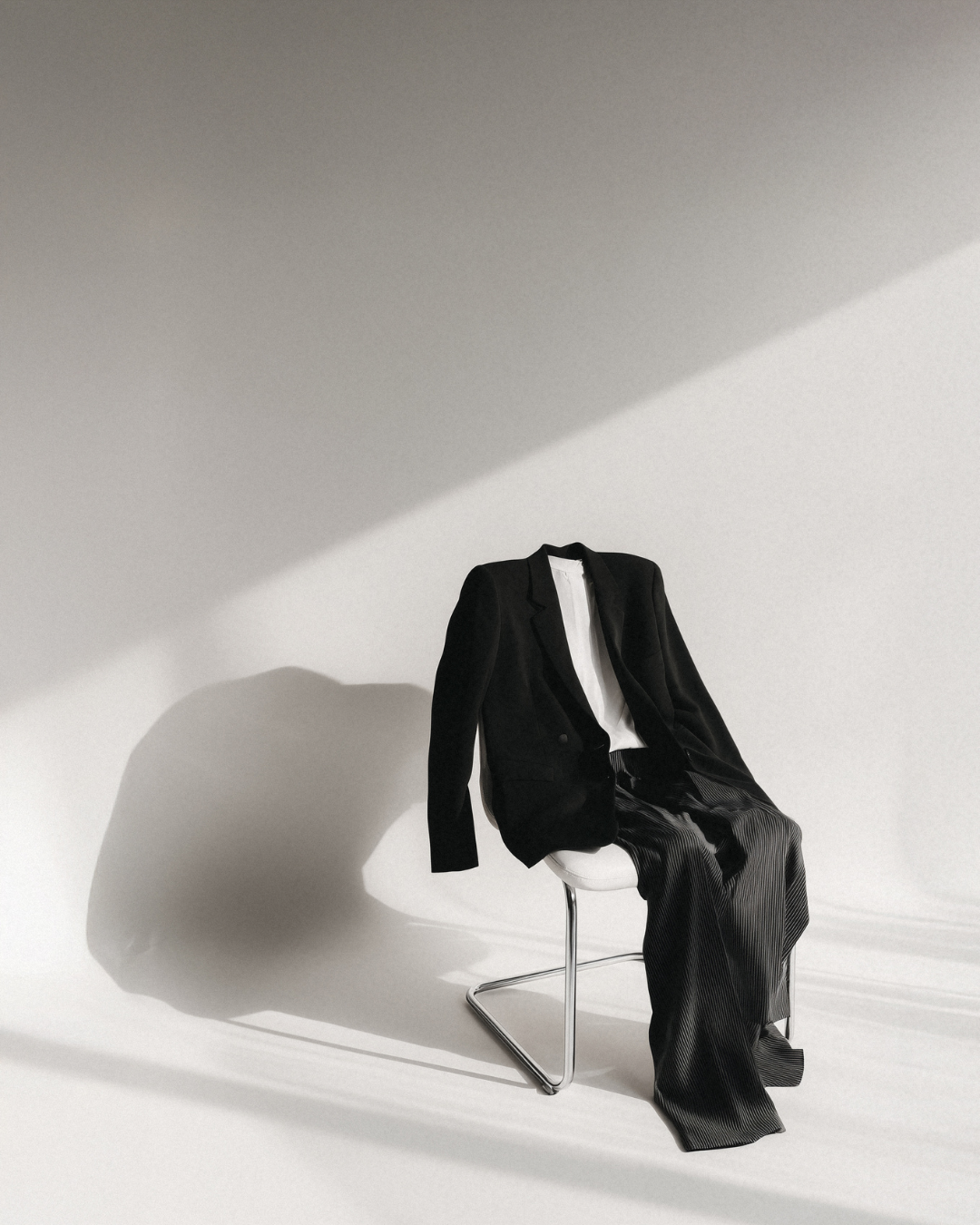 Neutral blazer outfit for branding photos in editorial style studio setting